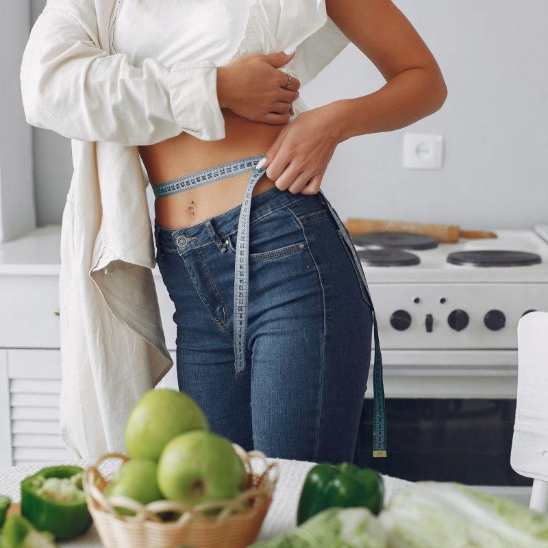 beautiful-sporty-woman-kitchen-with-vegetables-scaled.jpg